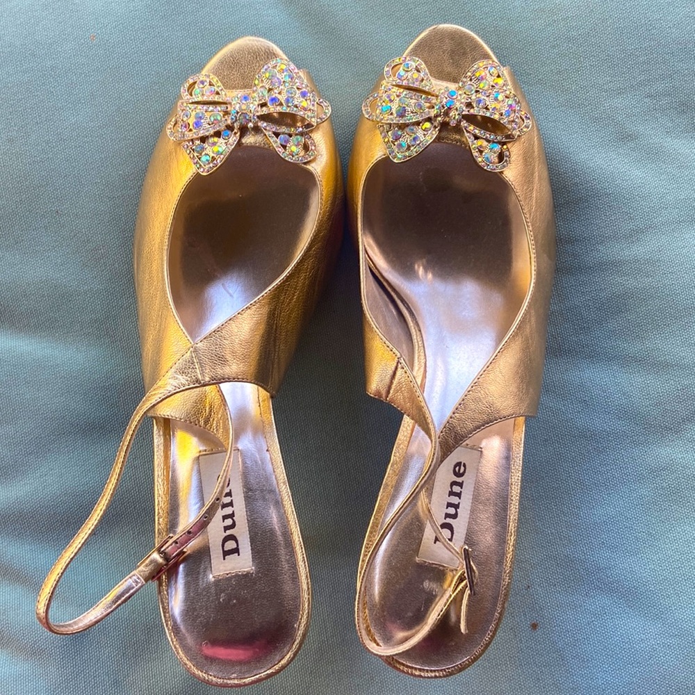 Gold open toed shoes
